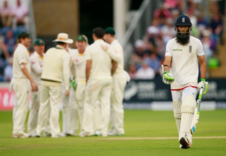 Moeen Ali walks off dejected after being caught by Brad Haddin off Mitchell Johnson.