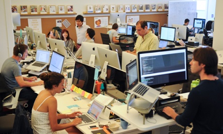 Employees of the social networking service Airbnb work in San Francisco.