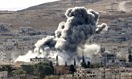 Smoke rises from an airstrike in Kobani, Syria, during fighting between Syrian Kurds and Isis