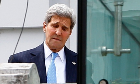 John Kerry walks on the terrace of Palais Coburg, the venue for nuclear talks in Vienna on Sunday.