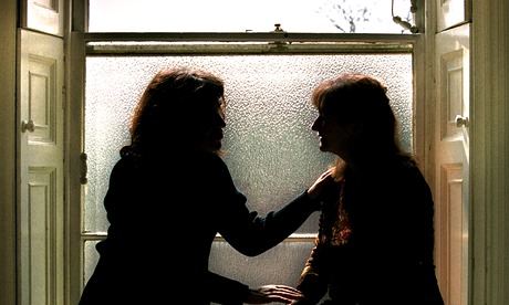 A FEMALE COUNSELLOR COMFORTS A FEMALE PATIENT. Image shot 2001. Exact date unknown.