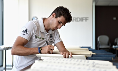 Steven Finn signing cricket bats. Finn looked sharp in the Middlesex attack against Somerset