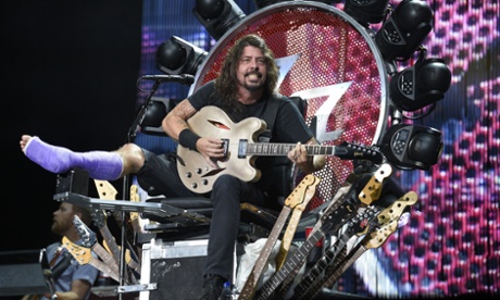 Foo Fighters' Dave Grohl performs with a cast at RFK Stadium in Washington. Grohl fell onstage in Sweden last month and fractured his foot.