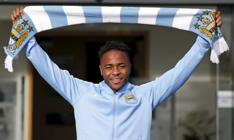 New Manchester City signing Raheem Sterling poses with a club scarf as he leaves the club's Etihad Stadium. Manchester City made Raheem Sterling the most expensive English player in history when they  paid 49 million pounds for Sterling.