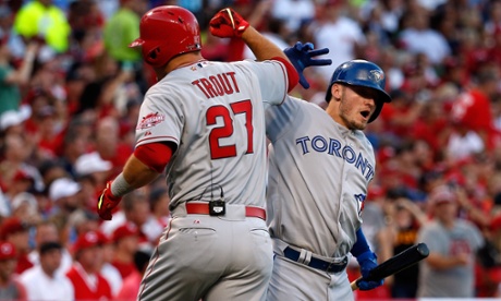I know, it looks weird, but it's the All-Star Game. Mike Trout hit a home run to lead off the 2015 ASG in Cincy, then celebrated with Josh Donaldson.