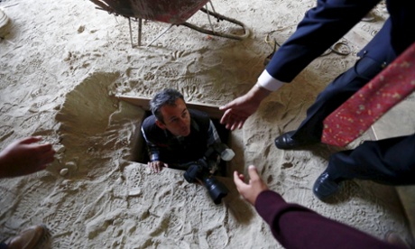 A photographer exits a tunnel connected to the Altiplano federal penitentiary and used by drug lord Joaquin 'El Chapo' Guzman to escape.