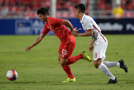 A burst of pace from Liverpool's Joao Carlos Teixeira takes him past Witthaya Madlam as Liverpool face the Thailand All Stars at Rajamangala stadium in Bangkok.