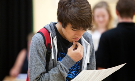 student reads A level results