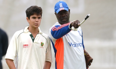 Arjun Tendulkar takes some advice from England bowling coach Ottis Gibson.