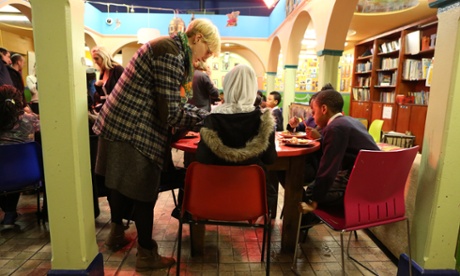 Children during dinner service at Kids Company in Lambeth.