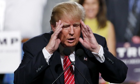 Republican presidential candidate Donald Trump looks shocked after catching sight of his hair in the mirror.