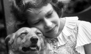 The future Queen hugging a corgi in 1936