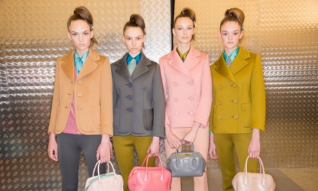 Models backstage at this season's Prada show, Milan fashion week. 