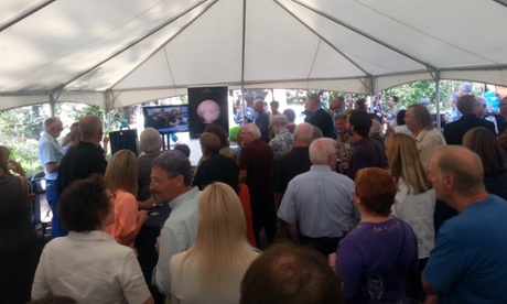 A large crowd gathers to watch Nasa TV live streaming at Lowell Observatory in Flagstaff, Arizona, where Pluto was discovered 85 years ago.