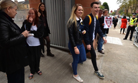 Young people leaving a polling station in Scotland.