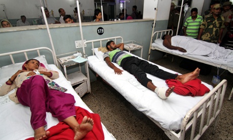 Indians are treated after being injured in alleged live fire from the Pakistani side of the border on Wednesday.
