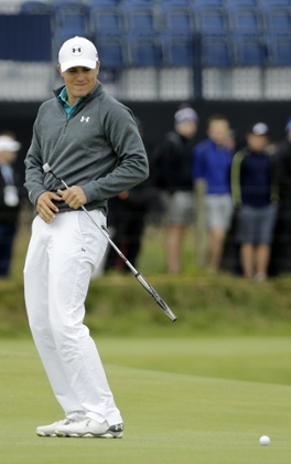 Jordan Spieth reacts after missing a birdie on the third.