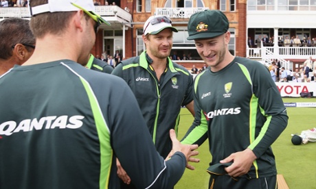 Peter Nevill of Australia is congratulated by Michael Clarke and Shane Watson of Australia after he received his Baggy Green Cap from former Australian Captain Steve Waugh.