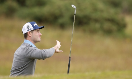 David Lingmerth throws his club after a bad shot onto the 14th green.