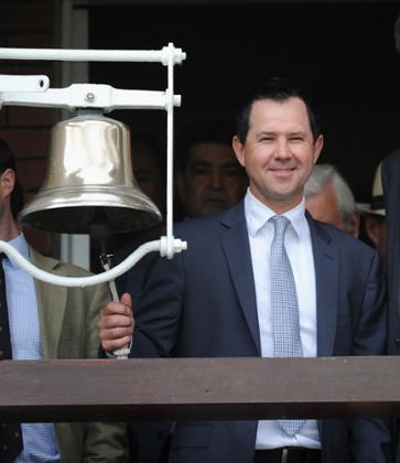 Ricky Ponting looks chuffed to be ringing the five minute bell.