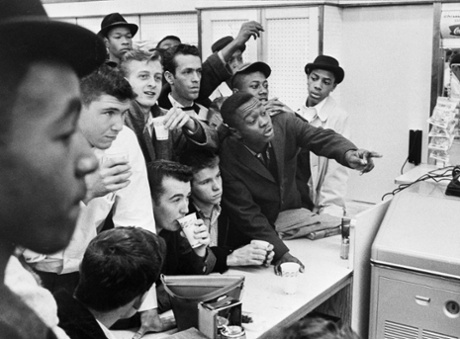 African-American students attempt to get served at a lunch counter reserved for white customers in Virginia in 1960.