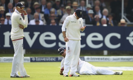Ian Bell of England looks at his hand after dropping Steve Smith.