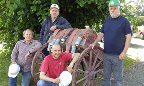 John Rudd (top left) and the rest of the Dufton fire-cart crew on the village green.