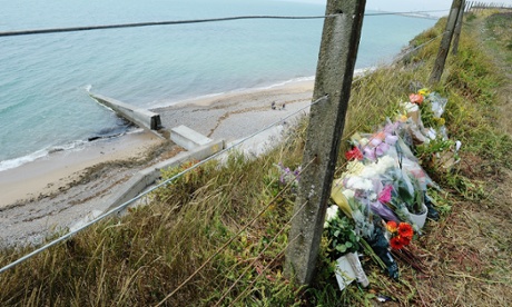 Flowers at the cliff-top location where Arthur Cave fell to his death.