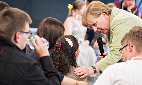 Merkel and crying child