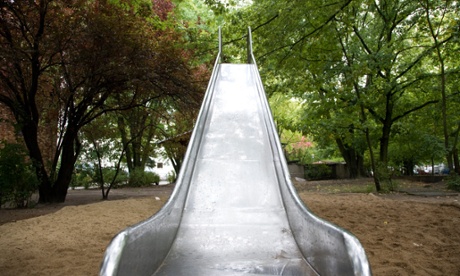 Metal slide in a children's playground – the summer sun can heat up equipment to dangerous temperatures.
