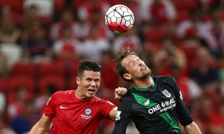 Peter Crouch, right, was the Stoke City player the football fans in Singapore wanted to see