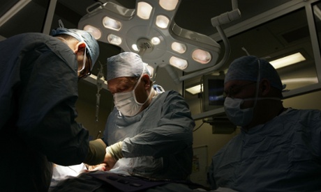 Transplant taking place at Queen Elizabeth hospital Birmingham. The BHF has called for it to be assumed people are prepared to donate unless they declare otherwise.