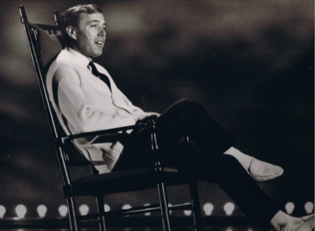 Val Doonican in his trademark rocking chair