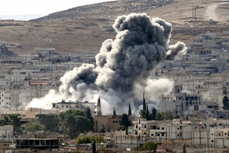 An airstrike by US-led coalition aircraft in Kobani, Syria