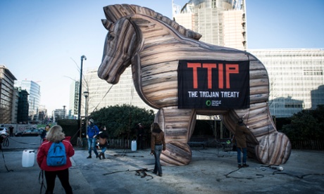 Friends of Earth Europe aet up inflated Trojan horse as they hold the prostest against TTIP agreement in front of EU headquarters in Brussels, Belgium on 4 February 2015