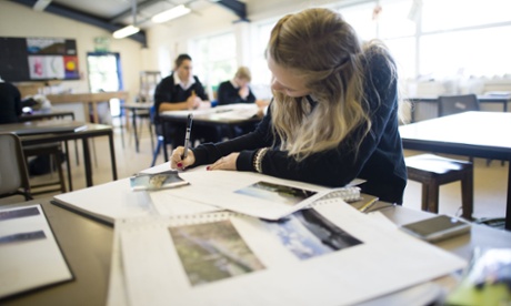Girl doing artwork at school