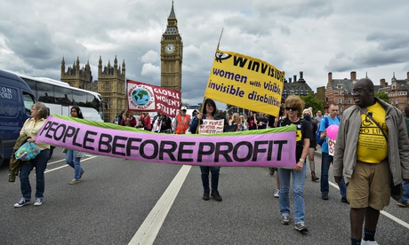 Disabled protestors take over Westminster Bridge on Budget Day