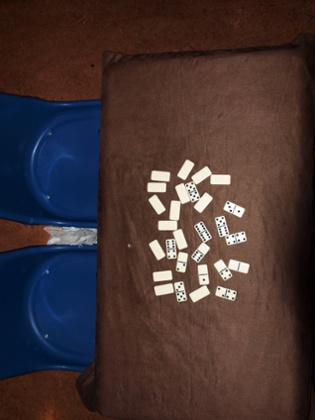 You realise how often dominoes feature in the pictures, how much time the detainees must kill playing the game ... Photograph: M Noor 