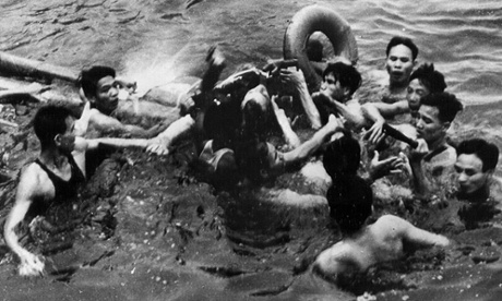 Photo released by the Vietnamese News Agency which is claimed to show the rescue on 26 October 1967 ago of then US navy pilot John McCain, centre, from Hanoi's Truc Bach lake.