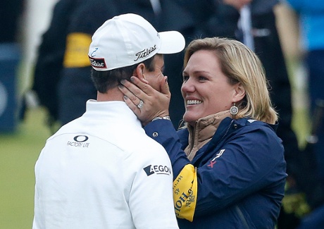 Zach Johnson celebrates his victory with his wife Kim.