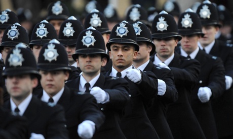 Police officers marching.