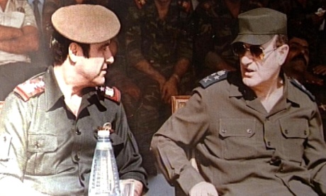 Picture taken in 1984 shows the late Syrian president Hafez al-Assad (R) with his youngest brother Rifaat (L).