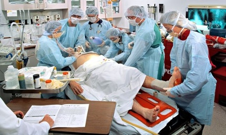 Doctors treat patient