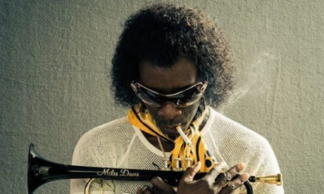 Don Cheadle as Miles Davis
