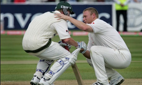 Andrew Flintoff consoles Brett Lee on the pitch.