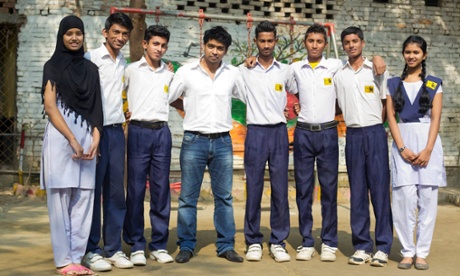 Korvi Rakshand and the first class of children taught at his school. 