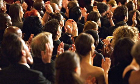 Clapping concert audience
