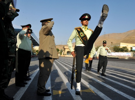 Iranian Major General Hassan Firouzabadi (center), Armed Forces Chief of Staff, reviews Iranians cadets during a graduation ceremony at the Armed Forces Institute on 20 September 2010.