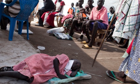 South Sudanese patients wait for medical treatment in the outpatient department of a medical camp.