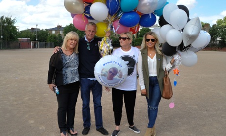 Henry Hicks's family release balloons in his memory.